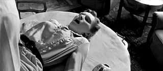 blonde lady in the table'